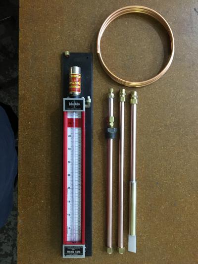 Why is a Model 1329 a good choice for a tank gauge?